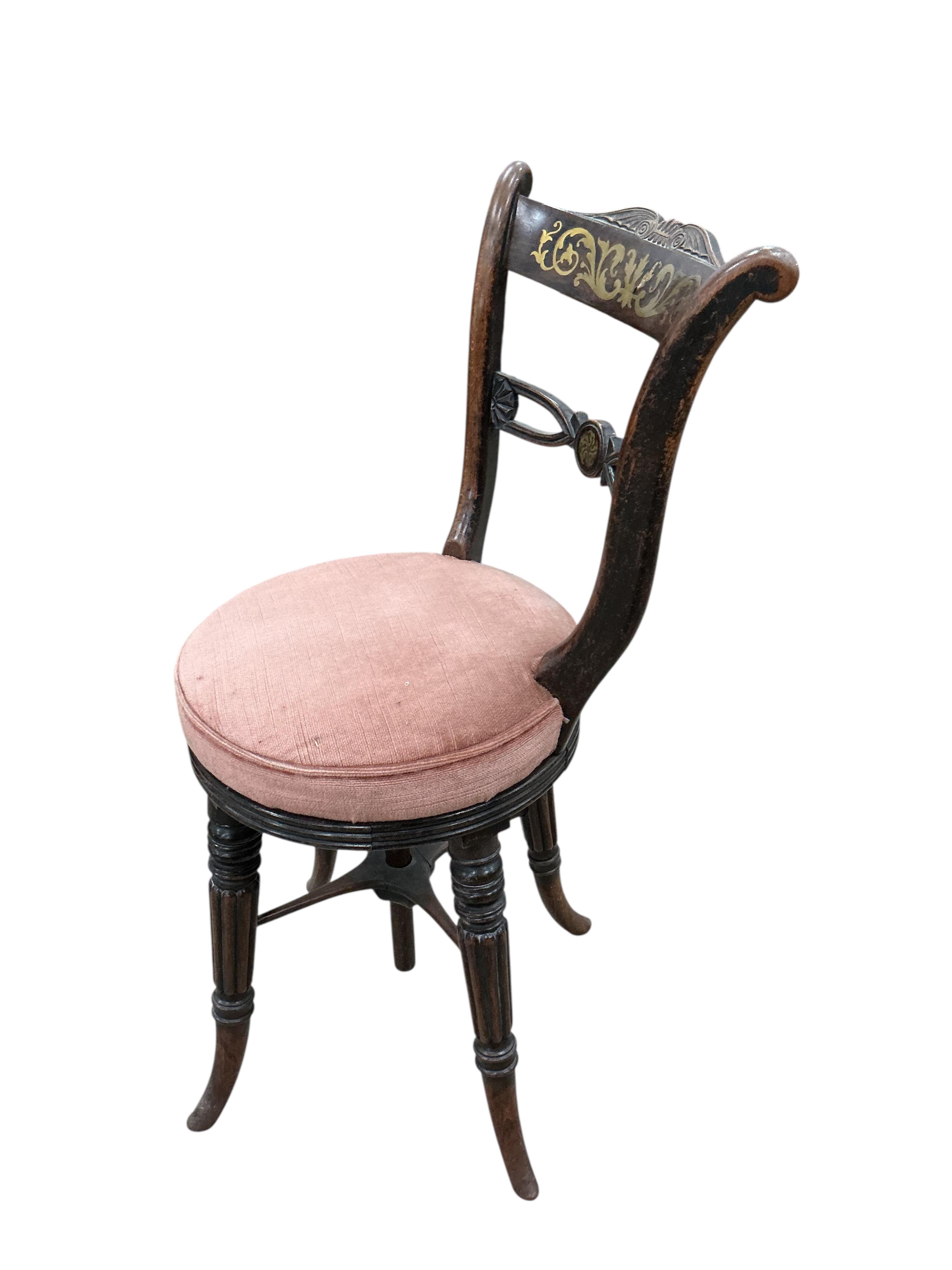 A Regency cut brass inlaid adjustable music stool, width 39cm